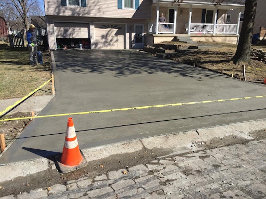 Concrete driveway replacement in progress at a Kansas City Northland home